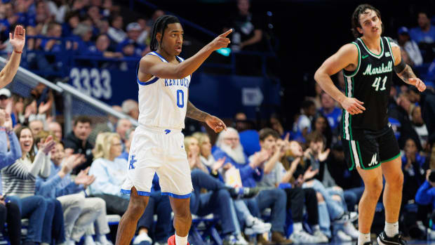 Nov 24, 2023; Lexington, Kentucky, USA; Kentucky Wildcats guard Rob Dillingham (0) celebrates after making a basket during the first half against the Marshall Thundering Herd at Rupp Arena at Central Bank Center. Mandatory Credit: Jordan Prather-USA TODAY Sports